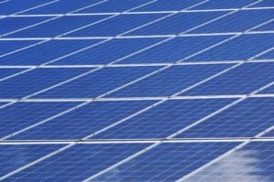 Close-up of solar panel installation on a home roof
