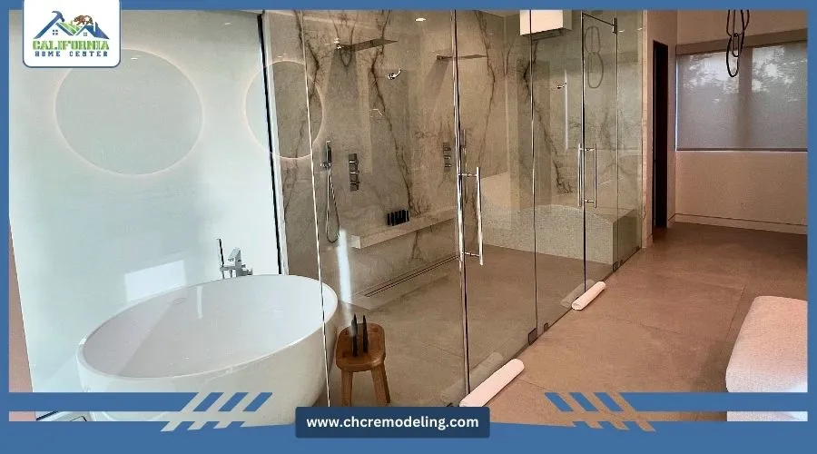 A luxury master bath featuring a double vanity, freestanding tub, and large shower.