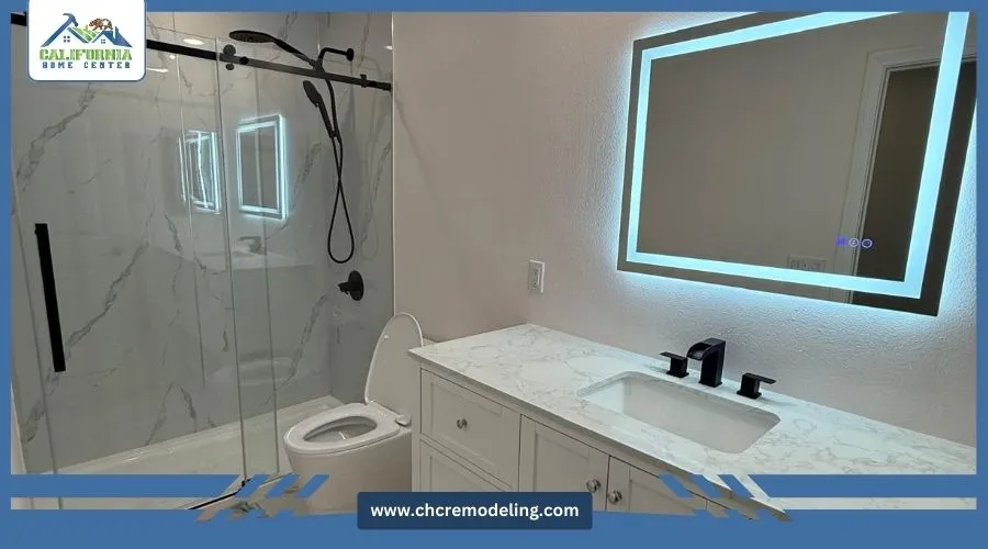Bathroom with stand-alone shower, toilet, and vanity