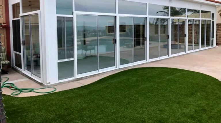 Custom glass patio enclosure and sunroom addition for a backyard remodeling project in Temecula, CA