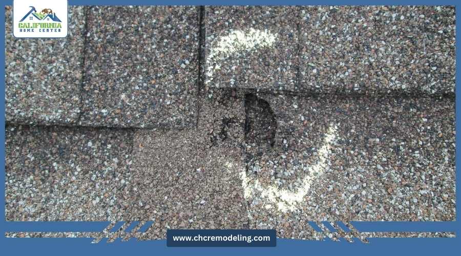 Hail damage visible on asphalt roof shingles